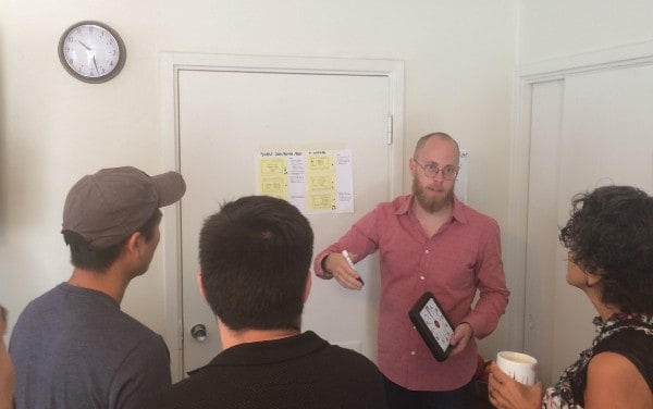 Douglas working with a group