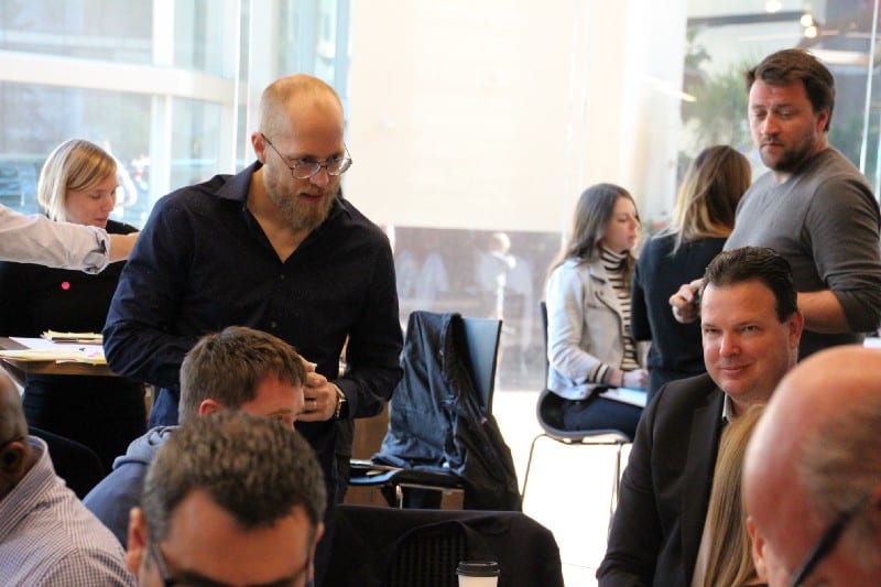 Douglas assisting people in a workshop