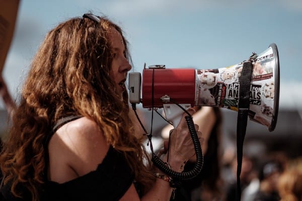 Woman using loudspeaker
