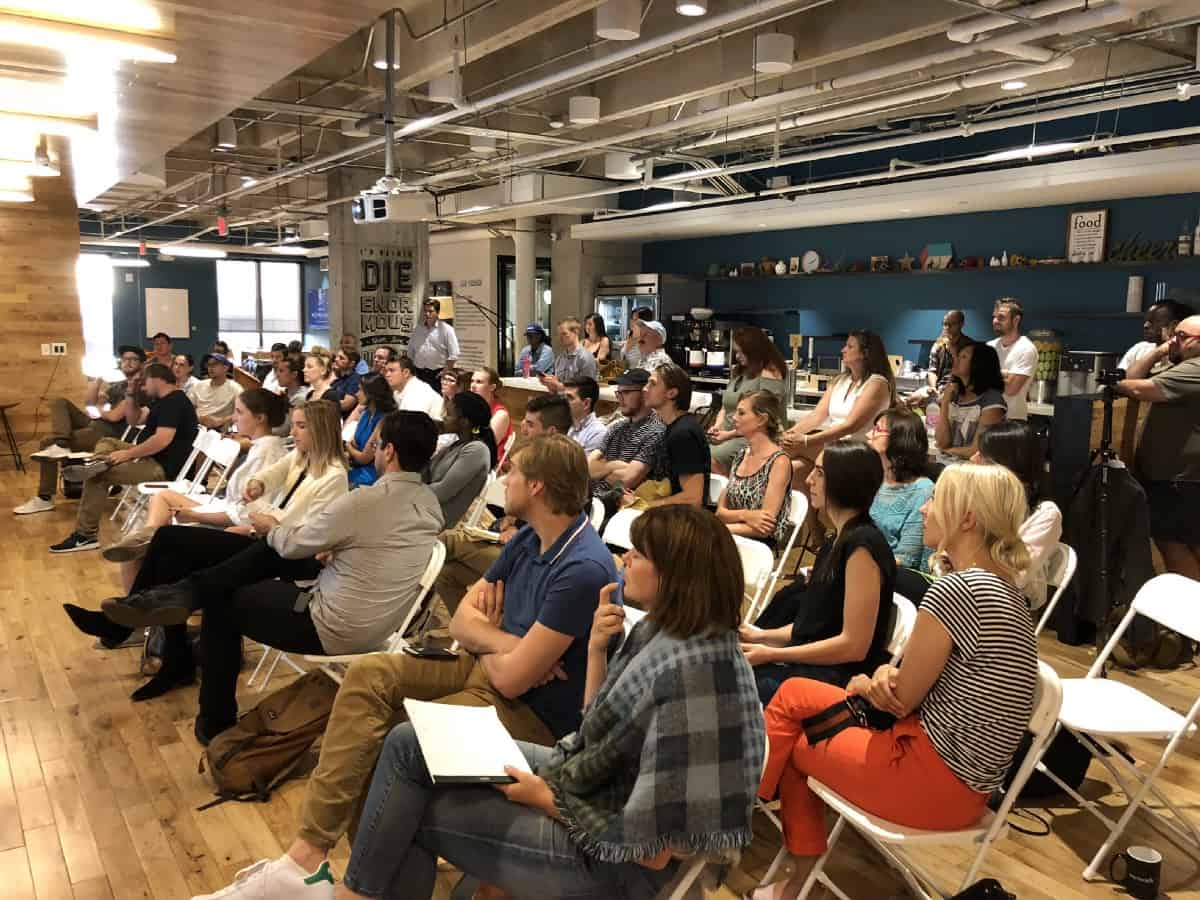 People sitting in workshop