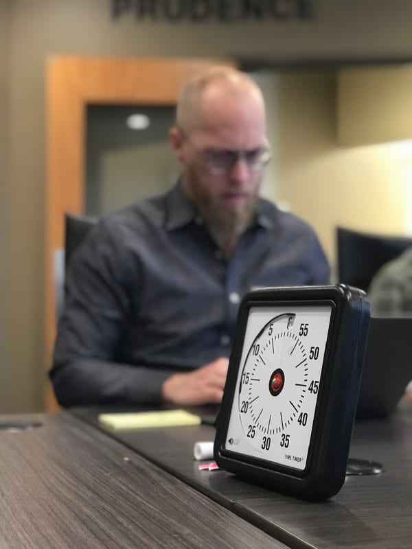 Douglas Ferguson working with group on time limit