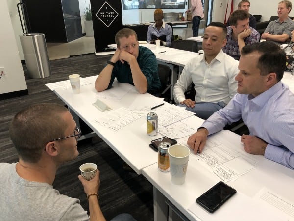 Group discussing the steps