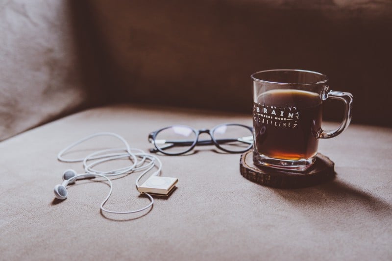 Headphones, tea and glasses