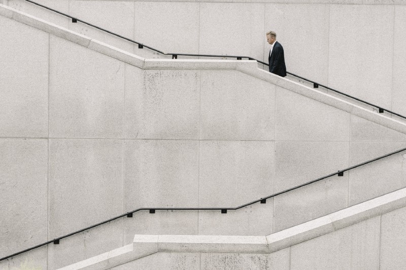 Man walking up stairs