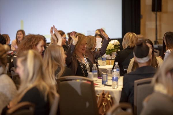 Conference attendees getting excited about Deborah’s ideas.