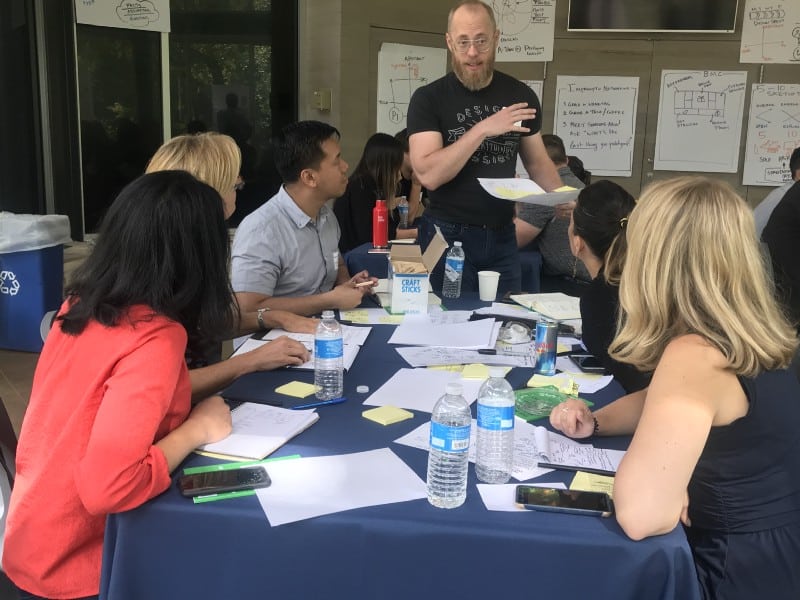 Douglas discussing ideas with a group