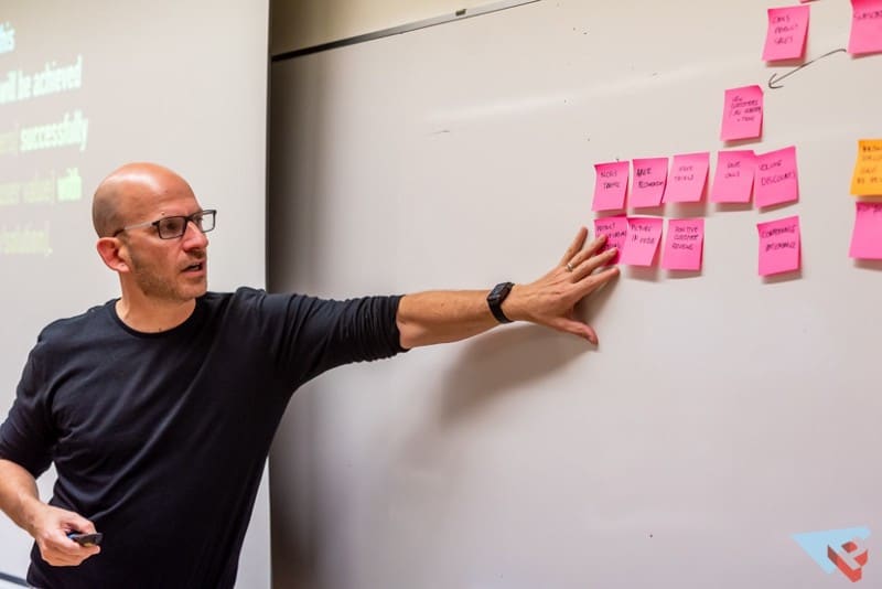 Jeff pointing out post it notes