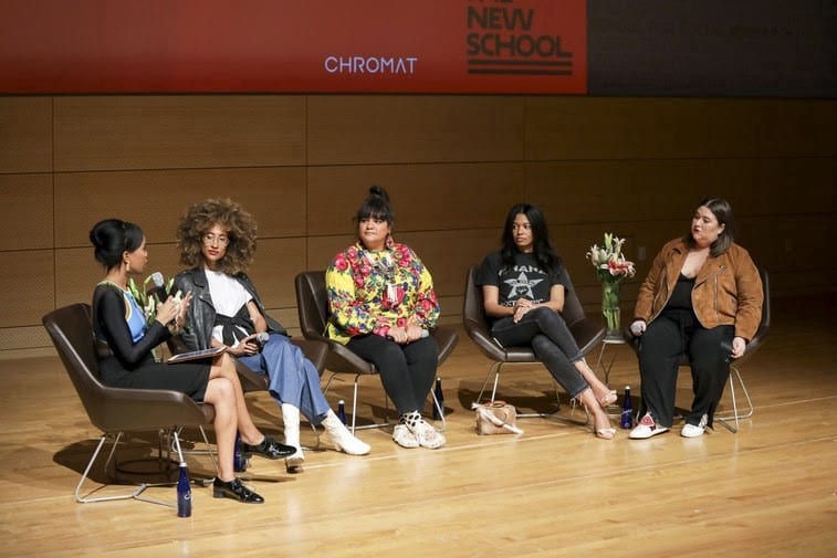 Kim speaking at the traveling workshop and lecture series, ‘Fashion & Justice.’