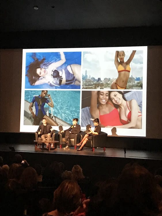 Kim speaking at the FIT Symposium, 2018.