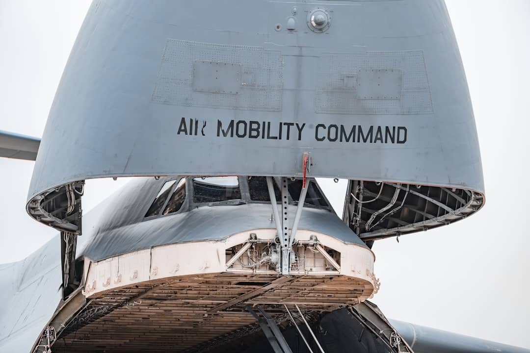 a close up of the side of an air mobility command plane - ai pilot failure post-mortem