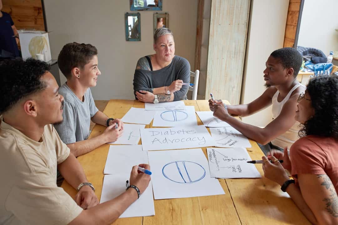 A group of people is having a discussion. - AI perception gap