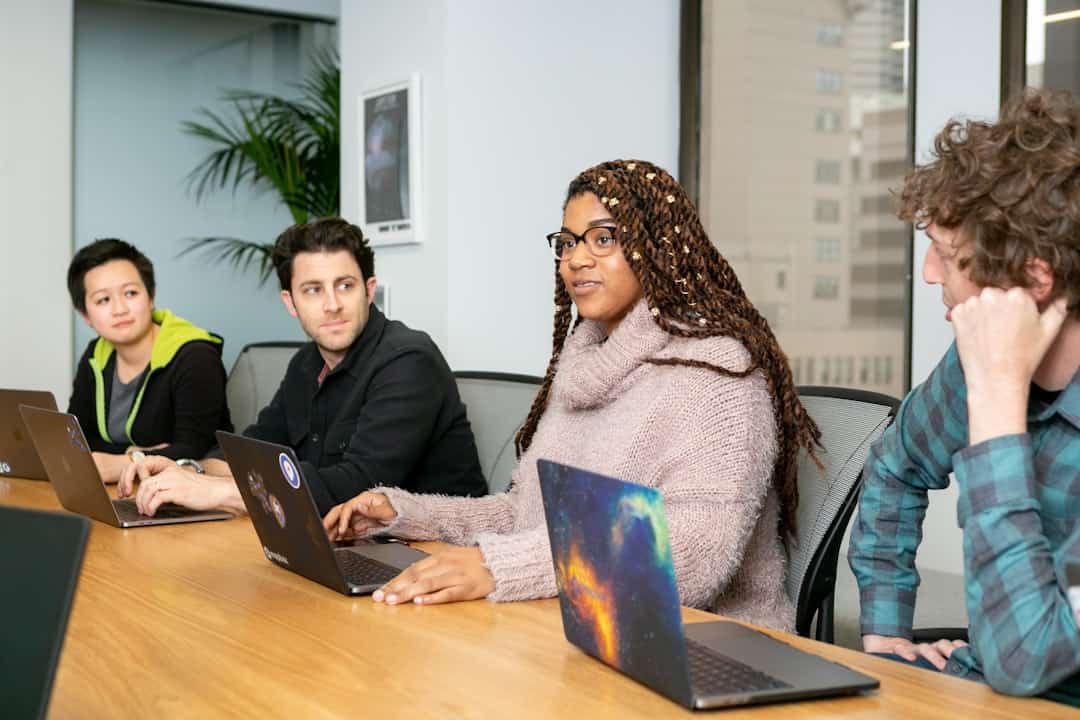 people in a group discussing app development - psychological safety ai adoption